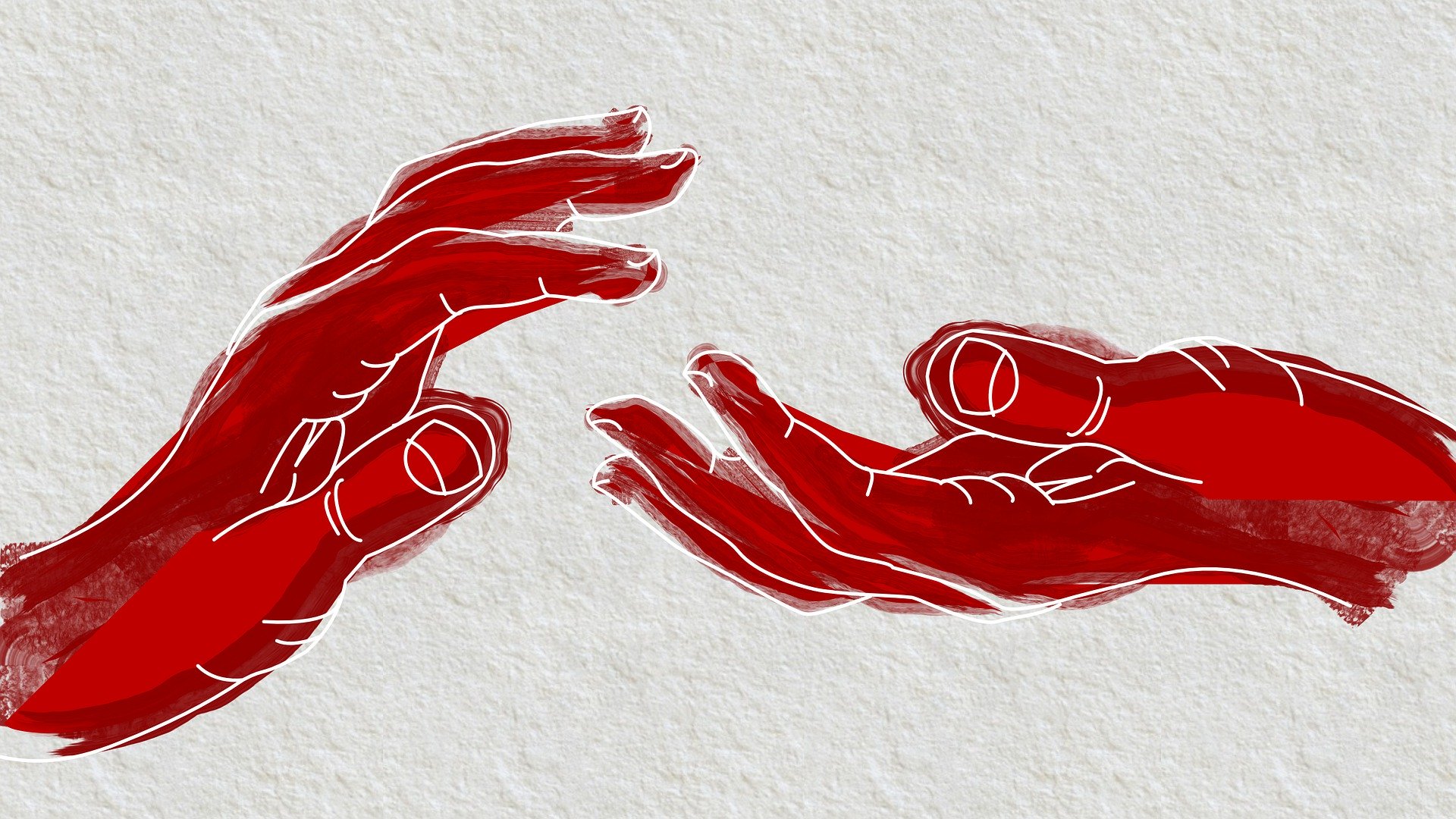 Kaksi punaista kättä, jotka kurkottavat toisiaan kohti.